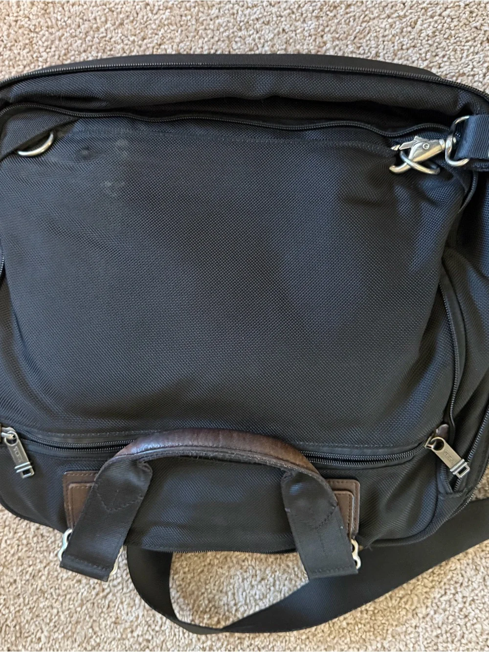 Tumi Black Backpack with Brown Leather Accents